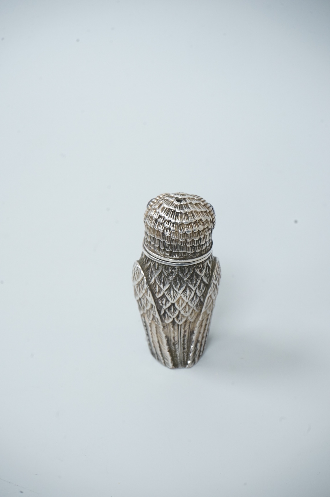A novelty silver plated condiment, modelled as an owl, with two faceted glass eyes, height 66mm.